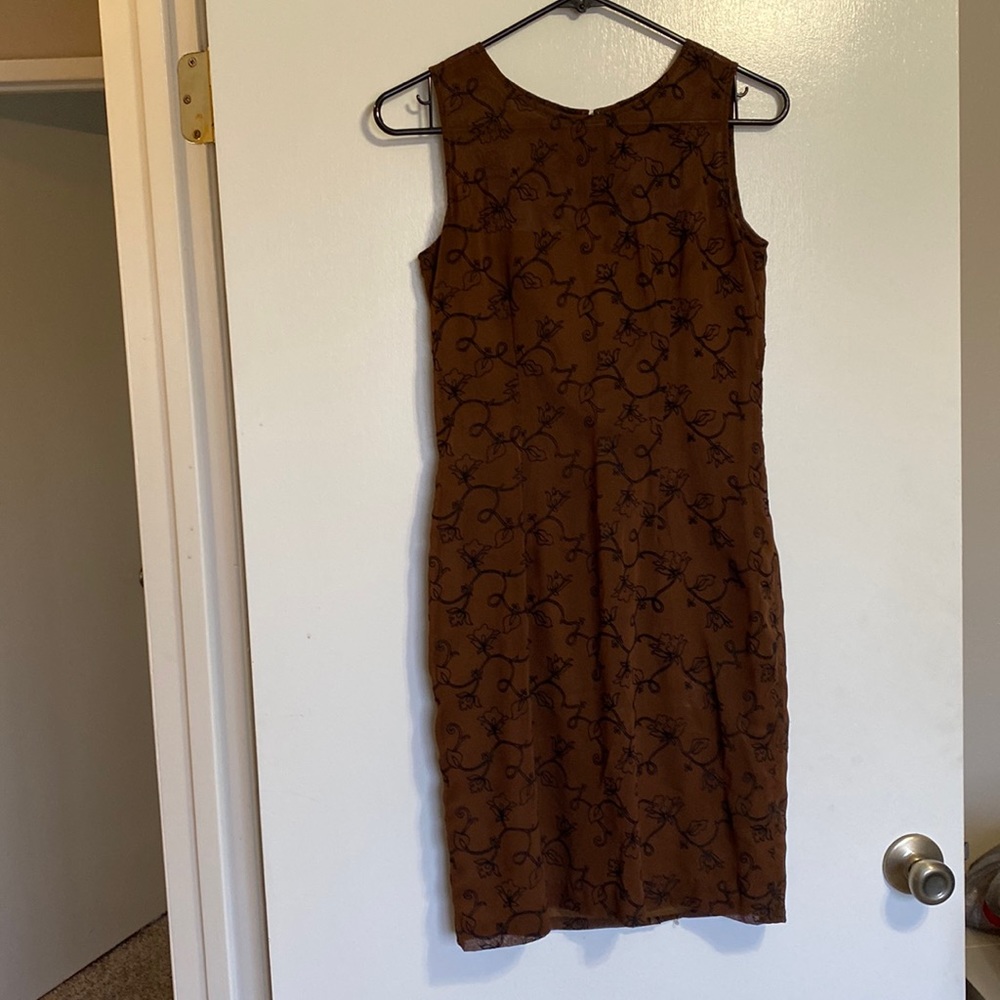 Brown shift dress.